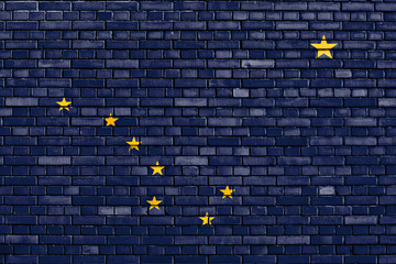 flag of Alaska painted on brick wall