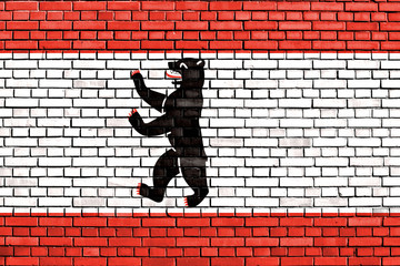 Berlin flag painted on brick wall