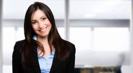     Smiling young female manager portrait