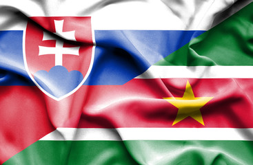 Waving flag of Suriname and Slovak