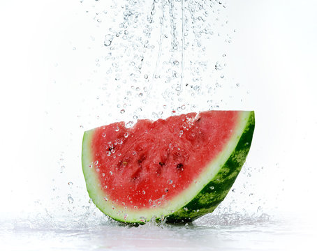 Red watermelon with splash of water