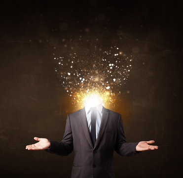 Business man with glowing exploding head