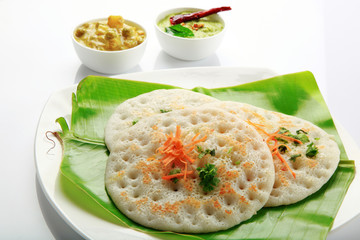 South Indian food set dosa with curry and chutney.