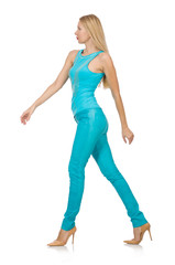 Pretty blond woman in blue pants and shirt isolated on white