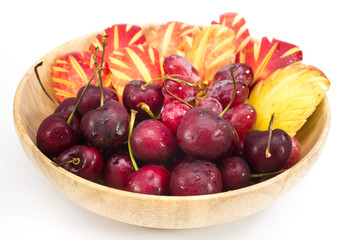 fresh Fruit in wooded Bowl on isolated background
