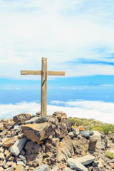 Christian cross on mountain top