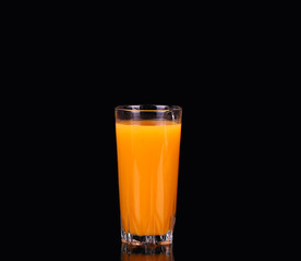 Carrots and juice in a glass