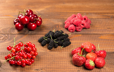 Collection of cherries, strawberries, mulberries, red currants,