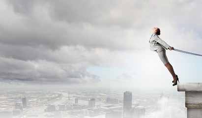 Roped businesswoman © Sergey Nivens