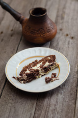 Piece of cake on the wooden table