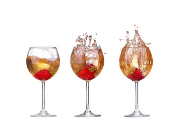 Collage Single Strawberry splashing into a glass of wine