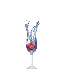 Strawberry splash in a cocktail glass on white