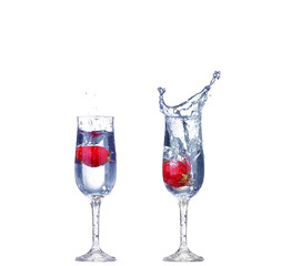 Collage Strawberry splash in a cocktail glass on white
