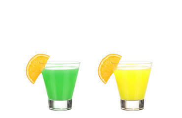 collage of green and yellow cocktail drink with orange slice isolated on white background