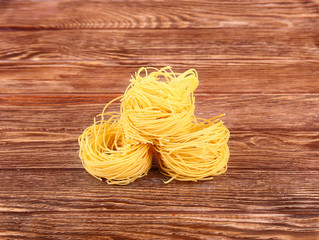 Pasta on wooden background