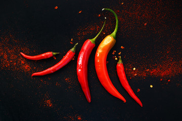 Chili peppers on a black background