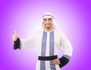 Naklejka premium Arab businessman against the gradient 