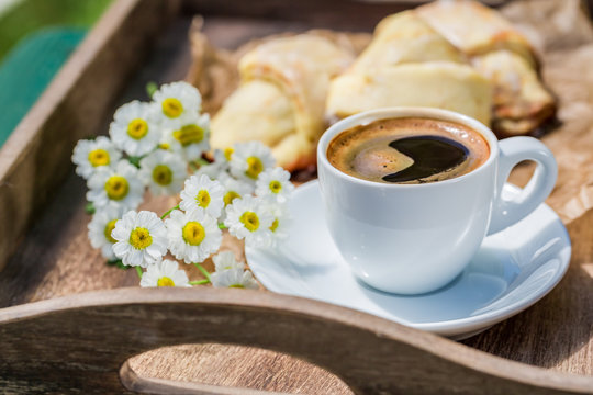 Sweet coffee and croissant