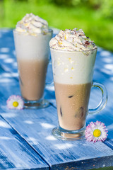 Cold coffee in sunny day