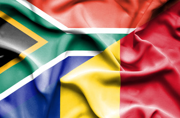 Waving flag of Romania and South Africa