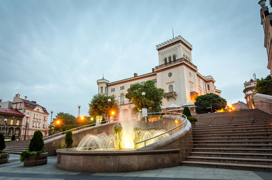 Main city square in Bielsko-Biala with fountain in front of Sulkowski castle 
