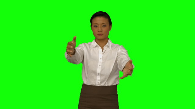 Businesswoman presenting with hands