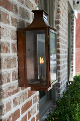 Brass gas lamp with flame