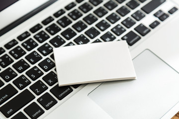 Business card on laptop keyboard