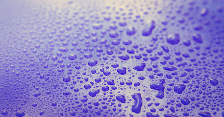 Drops of water on blue floor