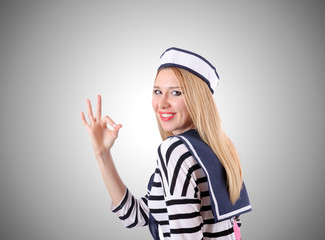 Woman sailor against the gradient background