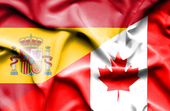 Waving flag of Canada and Spain