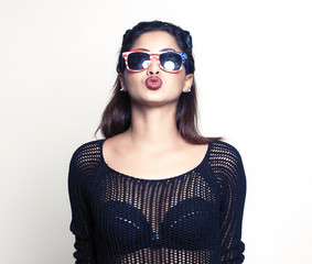 Kissing woman wearing american sunglasses and black sweater