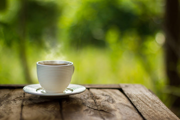 coffee cup on green background