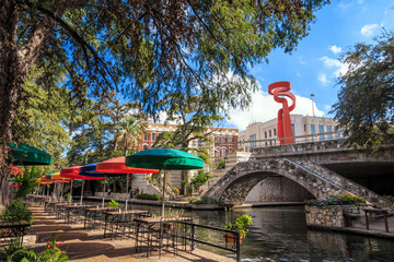SAN ANTONIO, TEXAS, USA - SEP 27: Section of the famous Riverwalk on September 27, 2014 in San Antonio, Texas. A bustling place with many restaurants and bars. - obrazy, fototapety, plakaty
