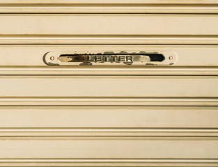 Letter slot on metal door