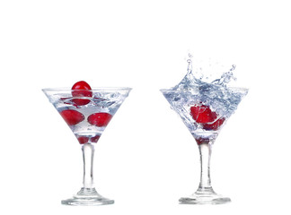 collage  cherry splash in a cocktail glass on white