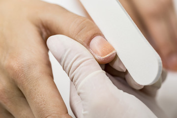 Photograph potsesse manicure in a beauty salon.