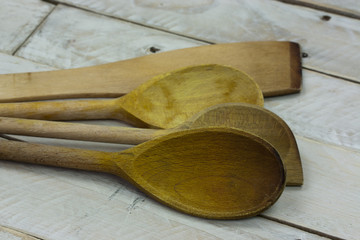 Wooden spoon on a rustic background