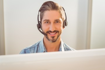 Call centre representative using headset