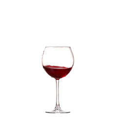 Fototapeta na wymiar Wine collection - Splashing red wine in a glass. Isolated on white background