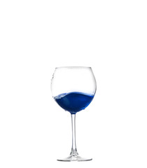 Blue cocktail in a glass isolated on white