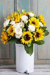 Bouquet of white roses and sunflowers