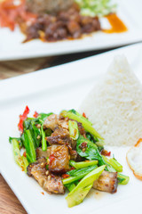 Kale with crispy pork and rice