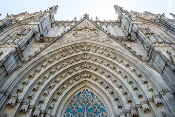 Main portal of Cathedral of the Holy Cross and Saint Eulalia at Gothic Quarter in Barcelona, Spain