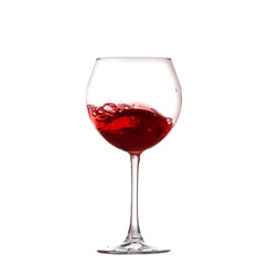 Wine collection - Splashing red wine in a glass. Isolated on white background