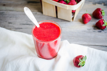 strawberry smoothie in a glass of fresh strawberries, rustic,  s