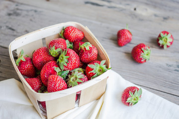 fresh strawberries in a box, raw summer berries, selective focus