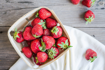 fresh strawberries in a box, summer berries, selective focus