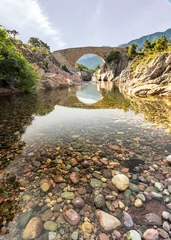 Zelfklevend Fotobehang Ponte Vecchiu bridge over Fango river in Corsica © Jon Ingall