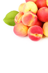 Fresh apricots on a white background